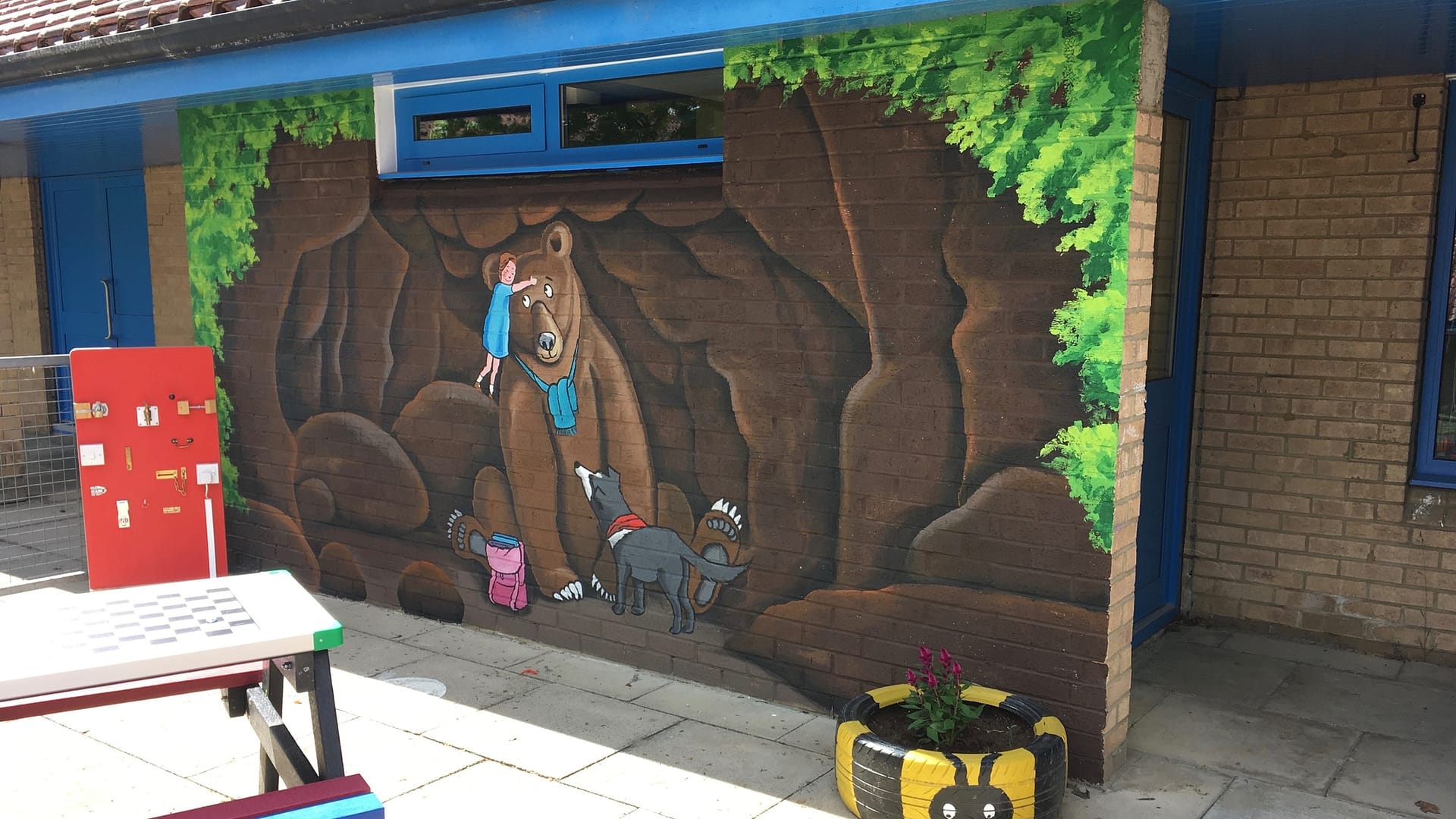 were going on a bear hunt cave, walworth school, school mural playground